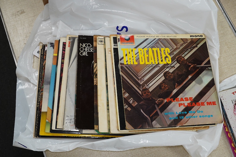 Twenty LP record albums including Three Beatles; please please me, with the Beatles, Beatles for sale, together with five Bob Dylan albums, Nico; Chelsea Girl, seven Monty Python albums, etc. Condition - fair.